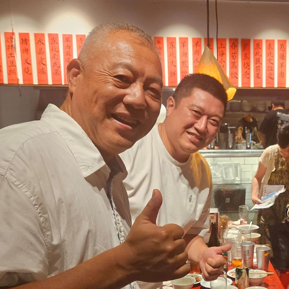 「陳家私菜」の陳龐湧さんと「食彩雲南」の牟明輝さん